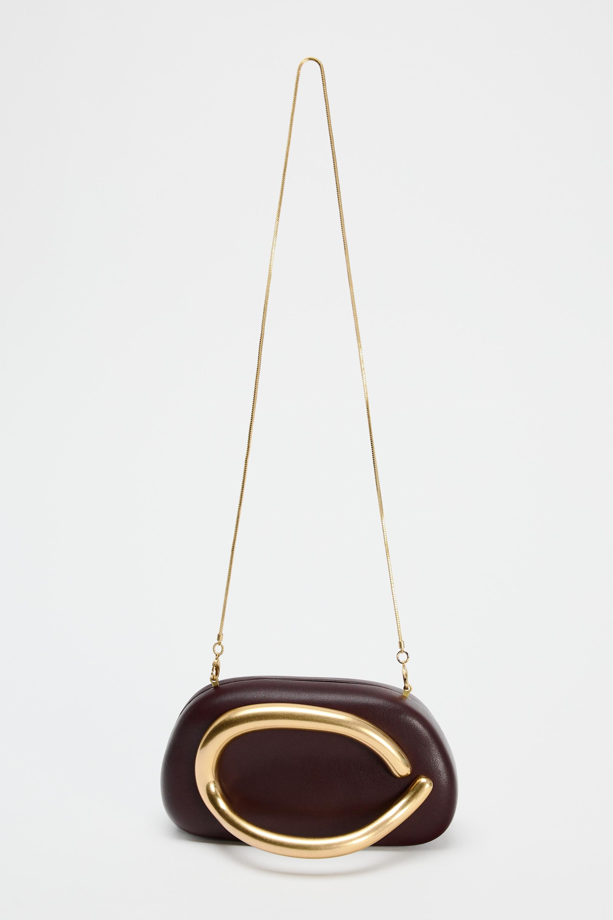 Oro Crescent Clutch