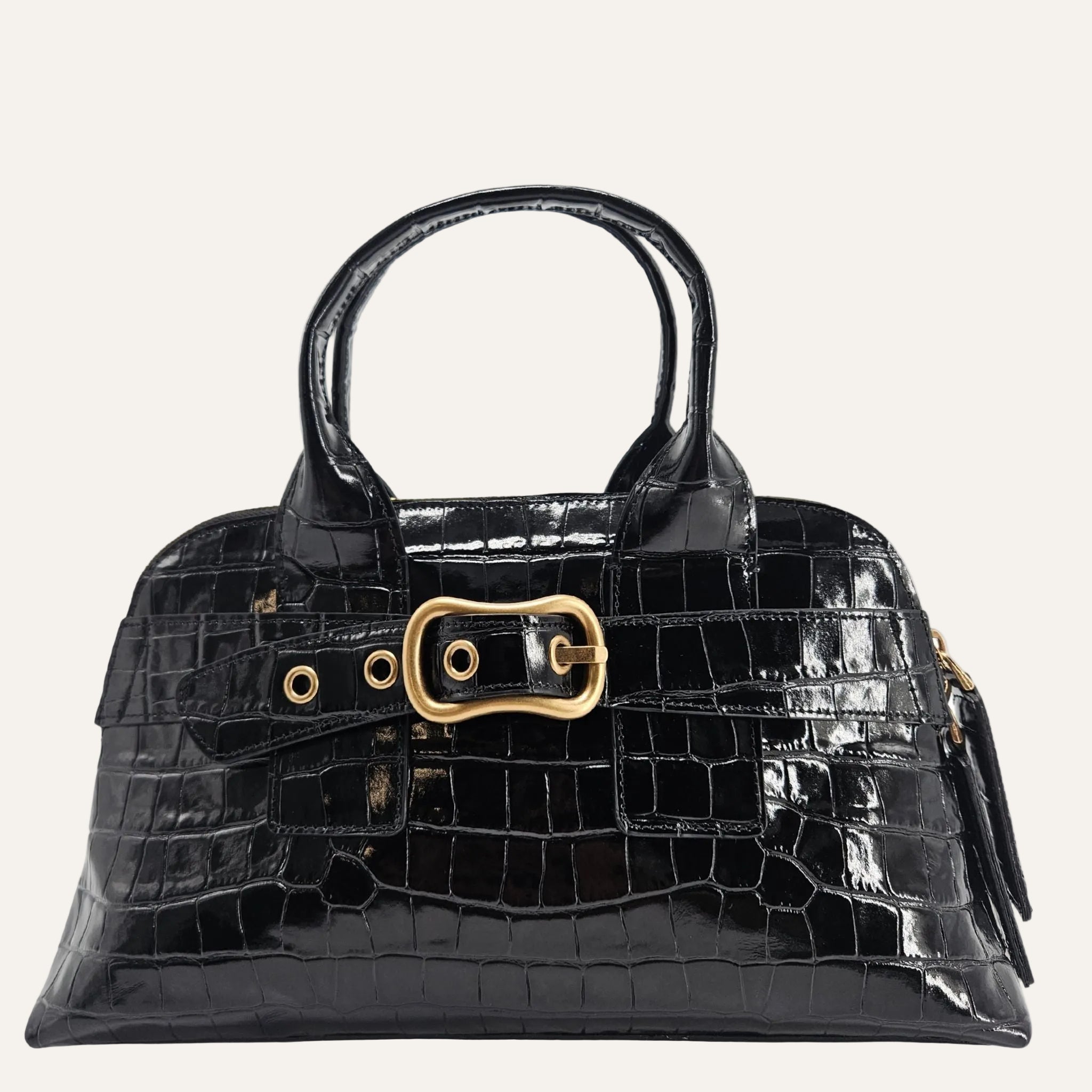 Black crocodile-patterned handbag with a gold buckle on a white background