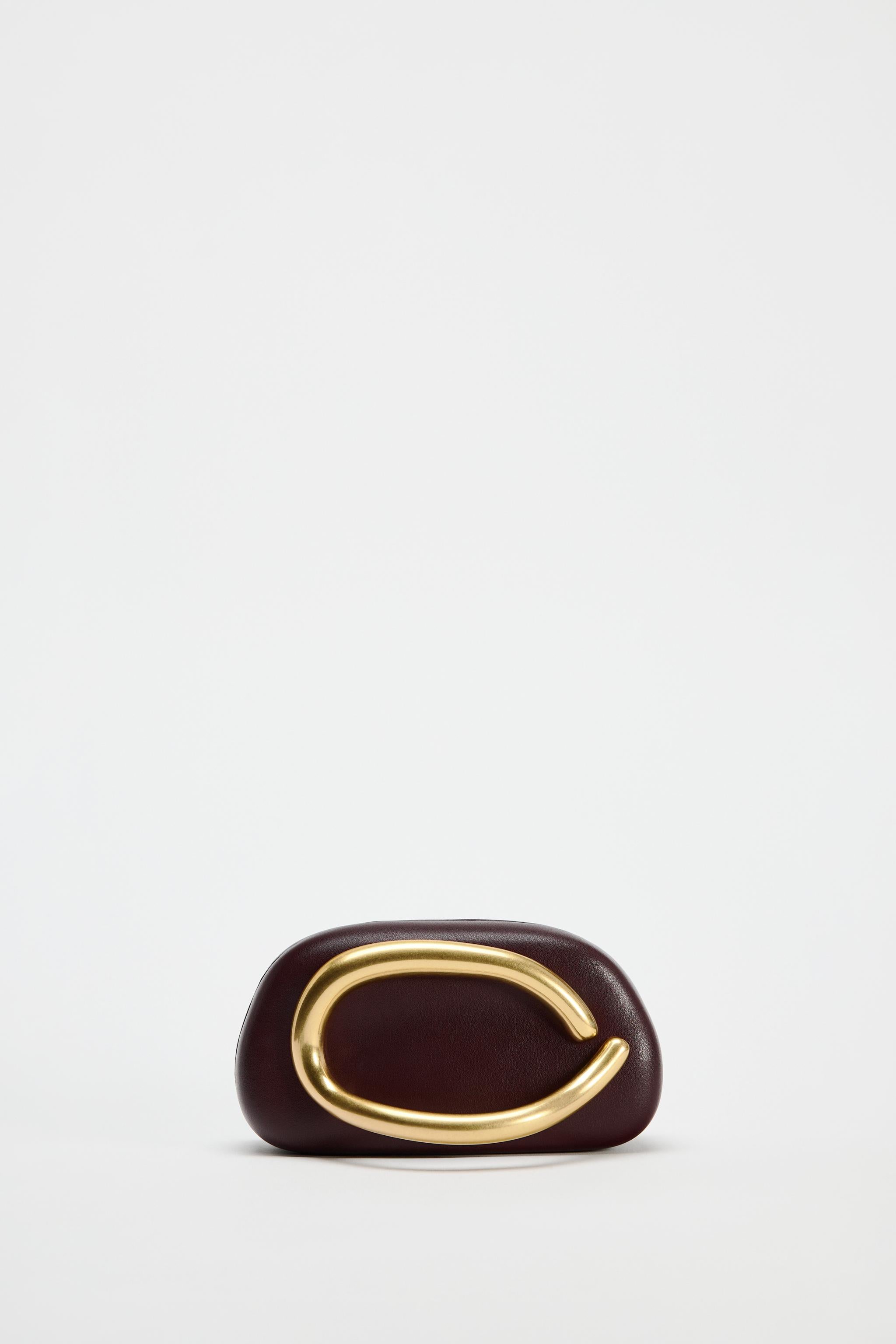 Oro Crescent Clutch