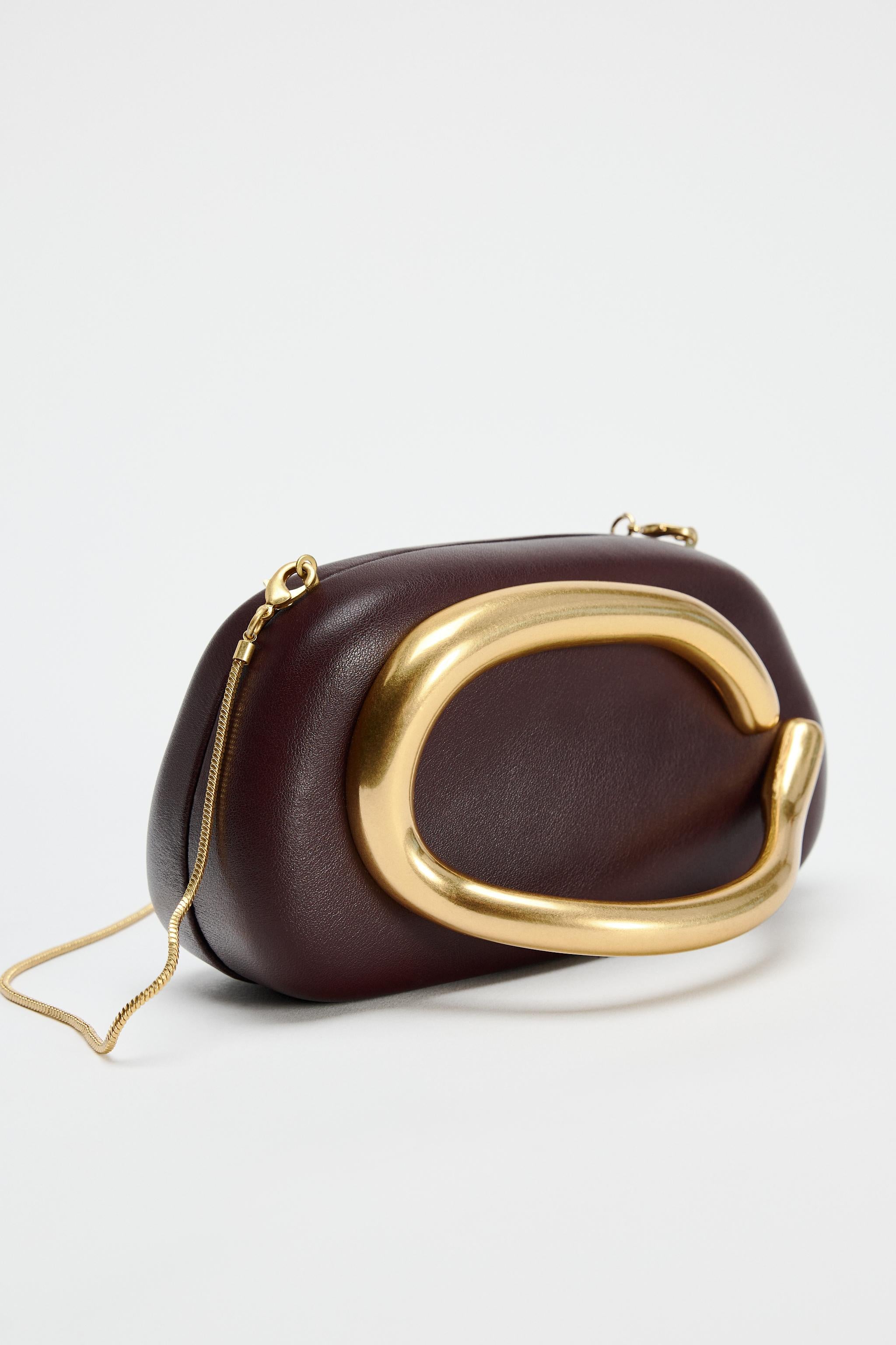 Oro Crescent Clutch