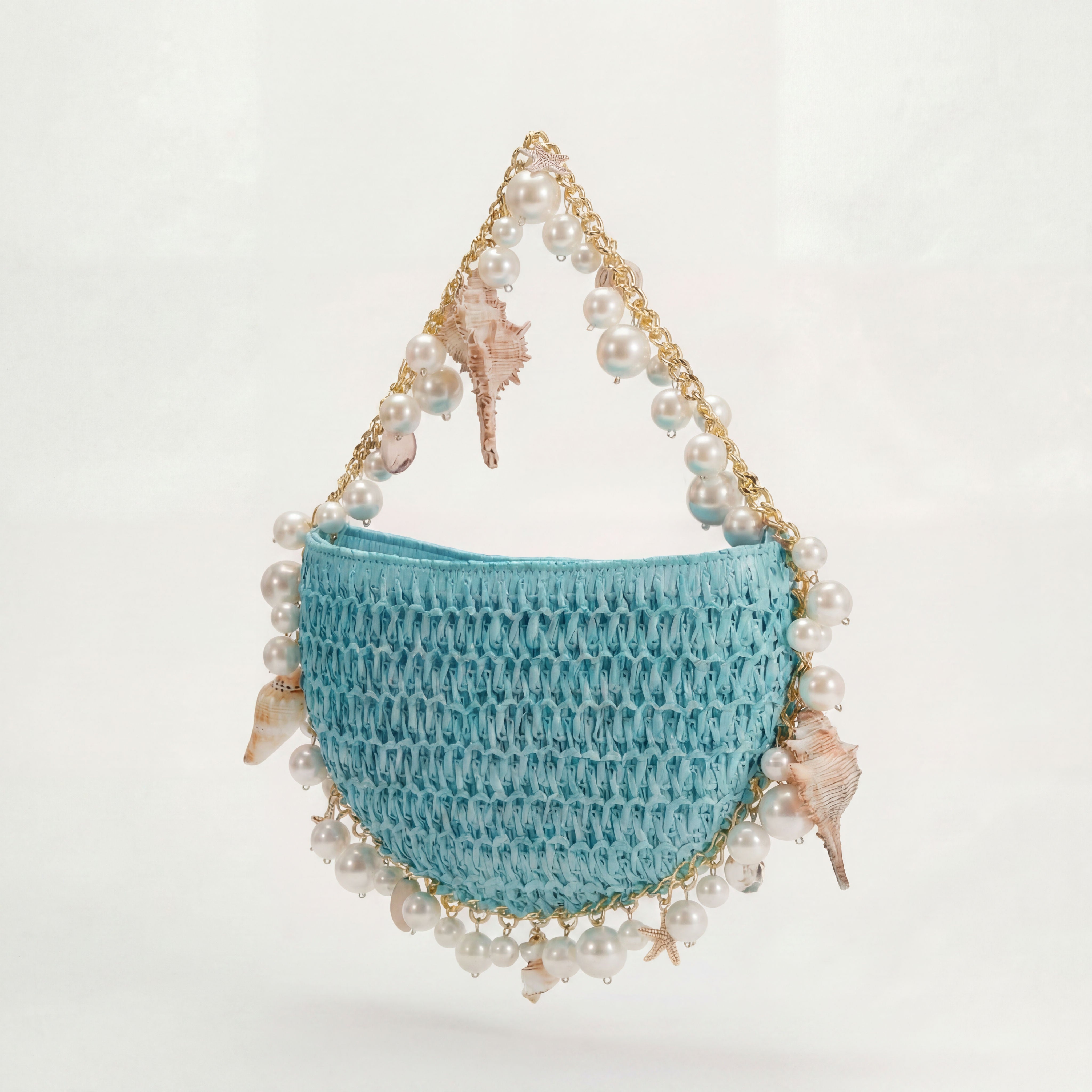 Handwoven blue raffia bag detail close-up, Riviera Blëu by Bahari