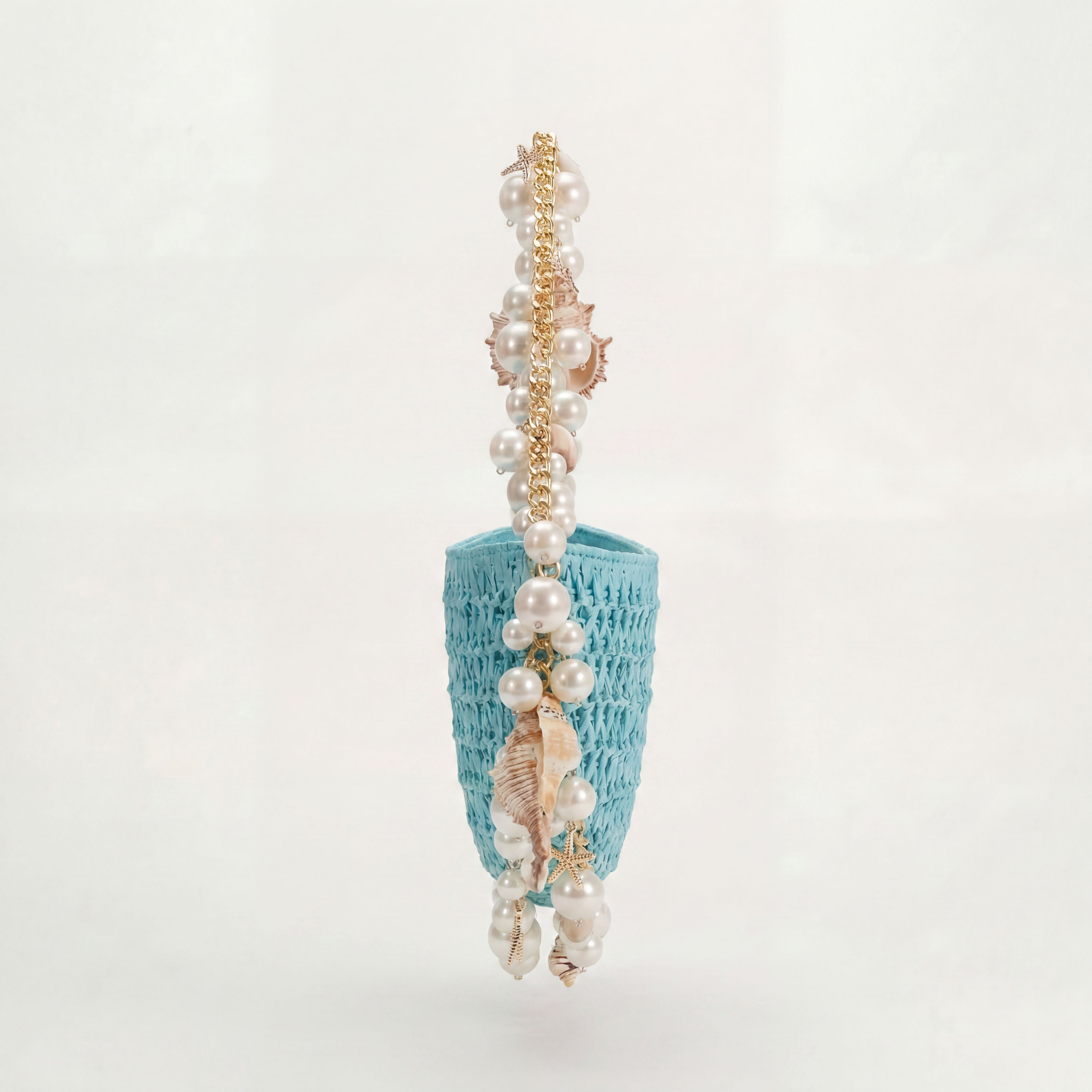 Riviera Blëu mini raffia shoulder bag styled for resort dressing, Bahari by Vohandas