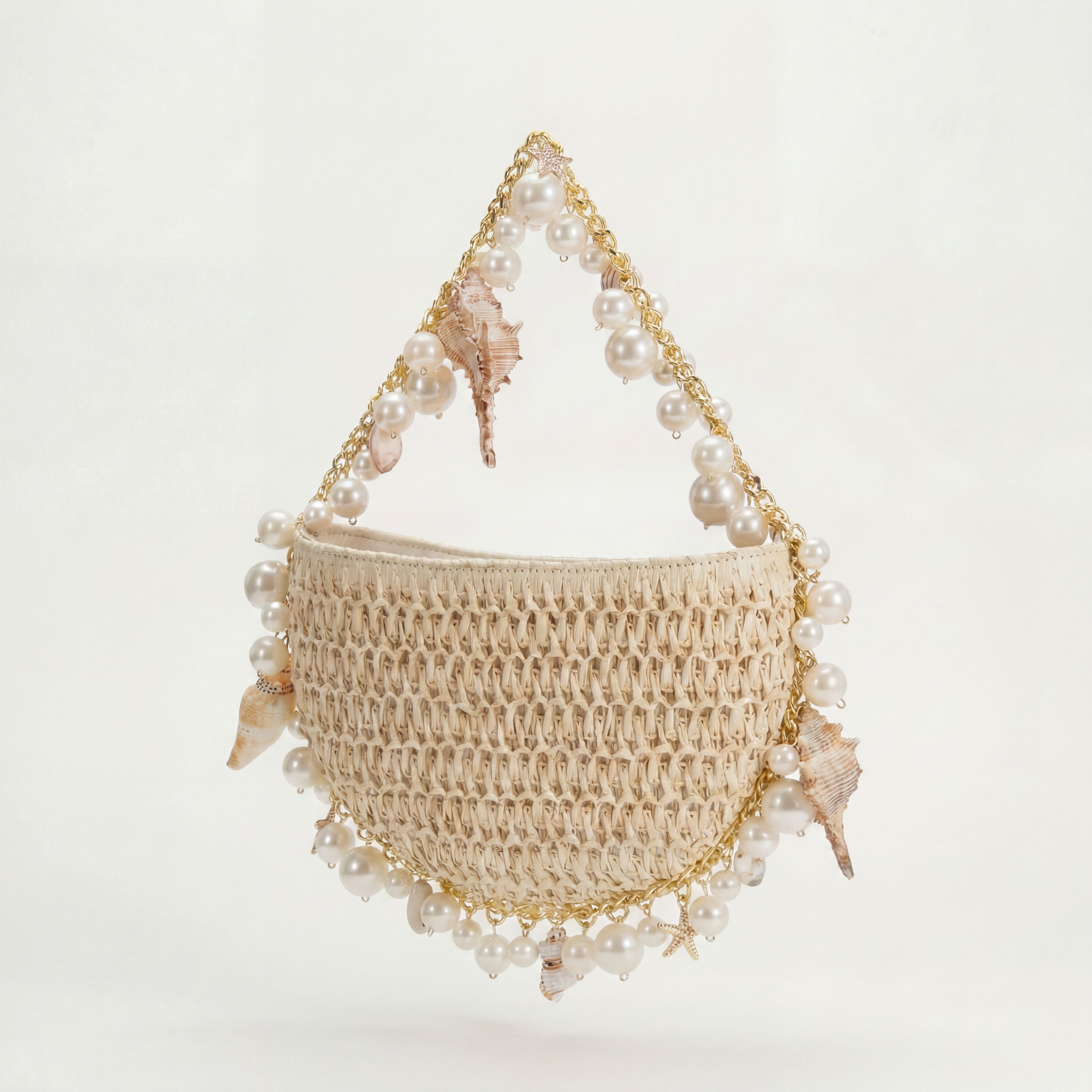Mini Bahari raffia shoulder bag in cream, handwoven detail close-up