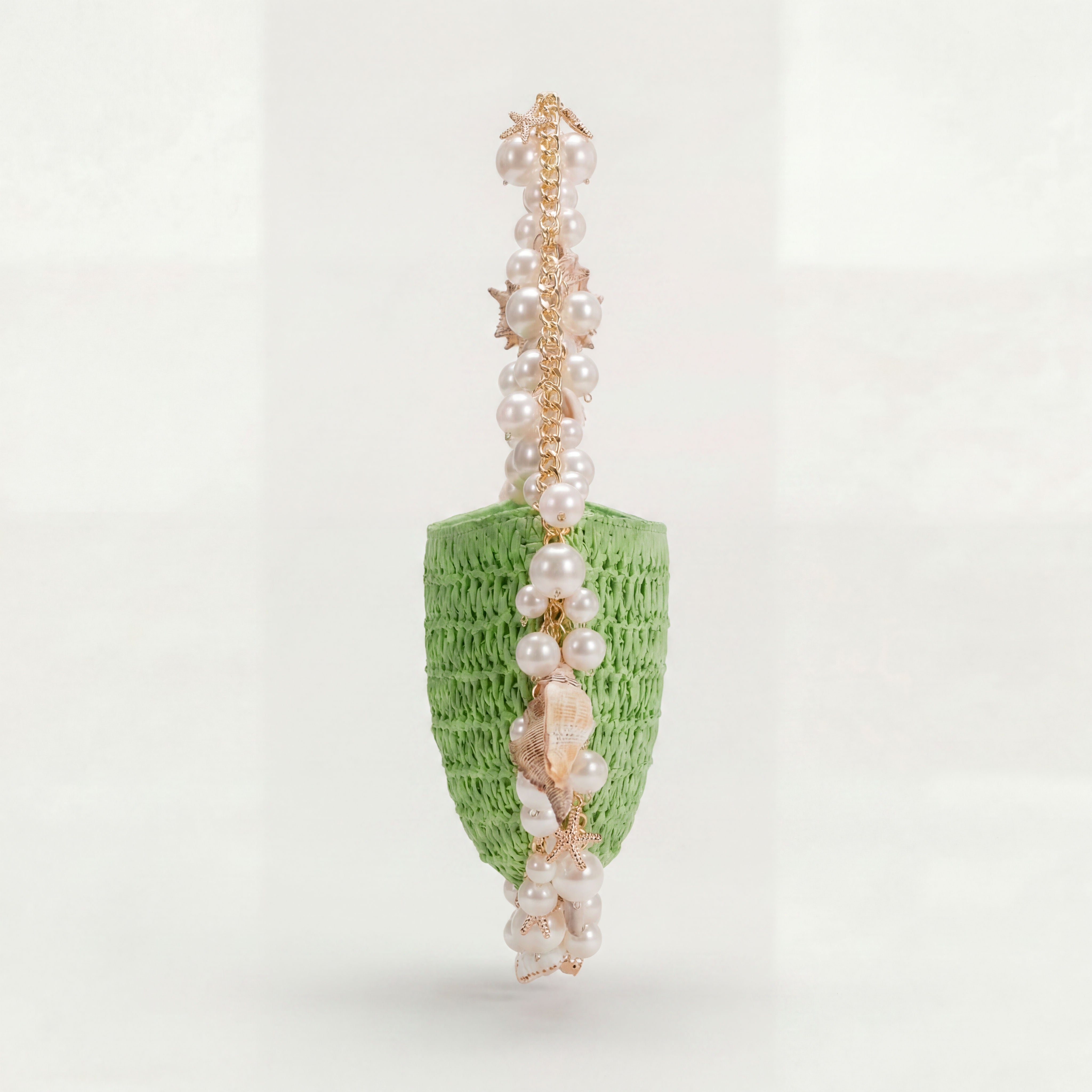 Coastal Mint mini raffia shoulder bag styled for a summer day, Bahari by Vohandas